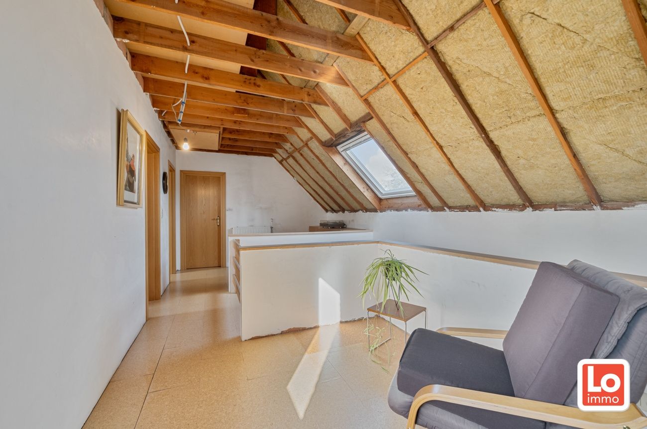 Ruime degelijke alleenstaande woning met afzonderlijke garage en carport op een makkelijk bereikbare locatie in Lokeren! foto 10