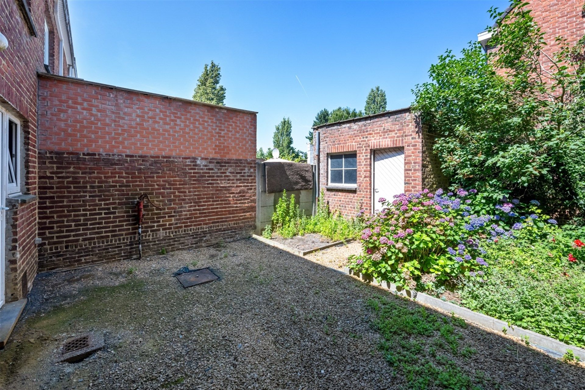 Ruime stadswoning met drie slaapkamers en tuin in centrum Aalst foto 13