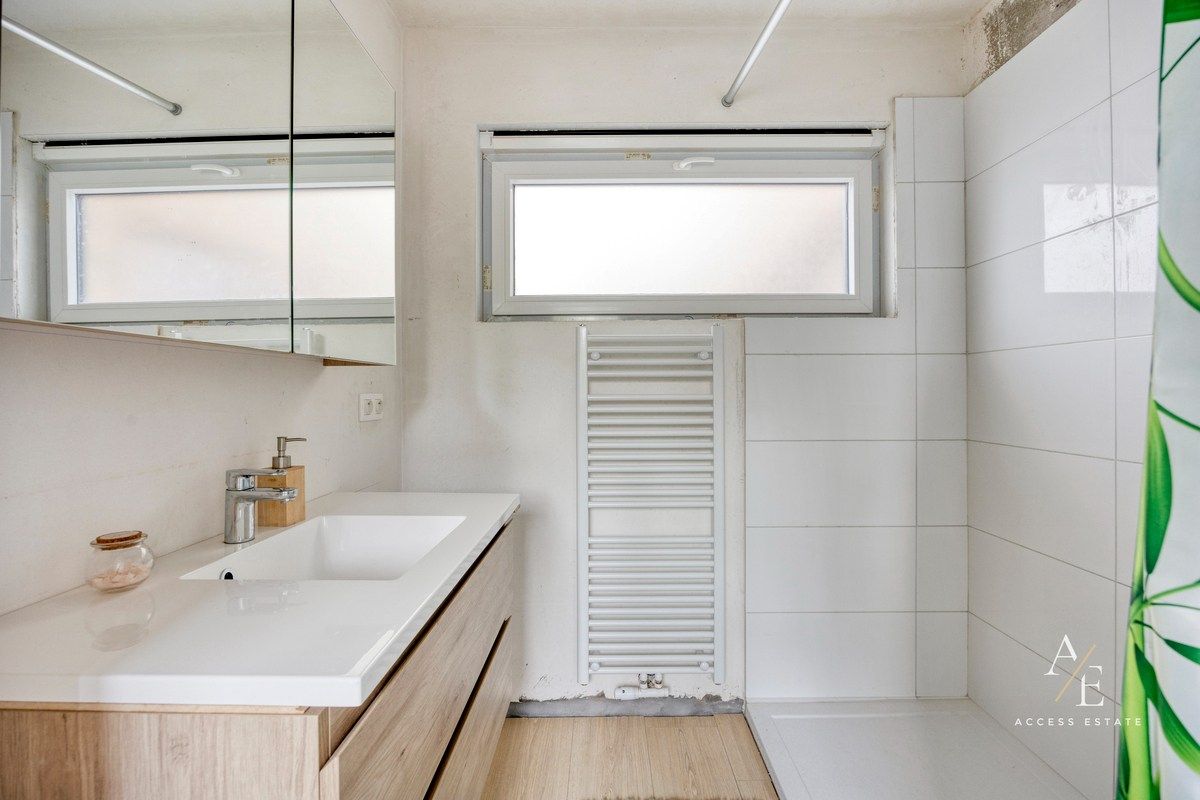 Ruime halfopen woning met potentieel in rustige straat te Melle foto 10