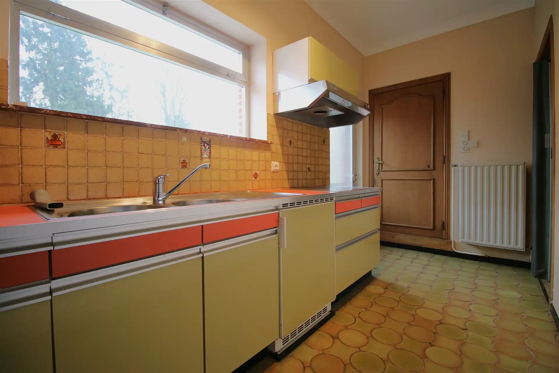 Te renoveren woning met tuin en garage foto 9