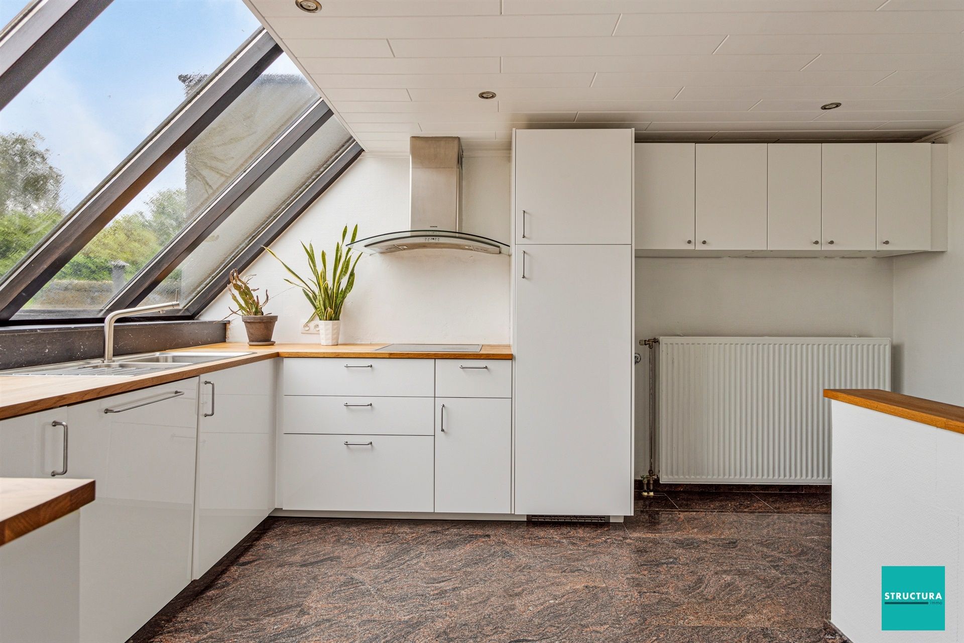 Veelzijdige woning met 4 slaapkamers en mooie tuin foto 21