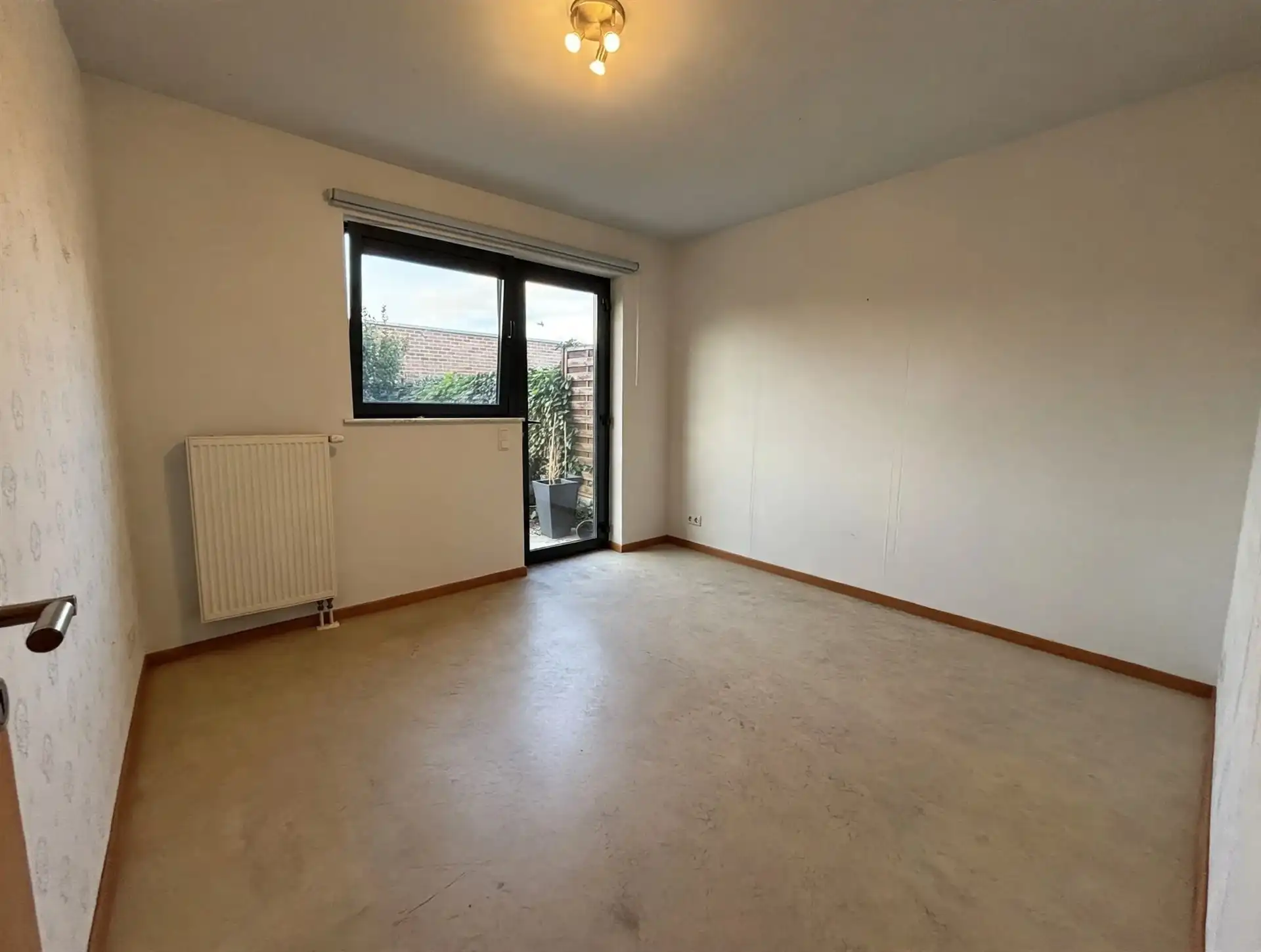 Gelijkvloers appartement met stadstuin en garage nabij het centrum van Aalst foto 7