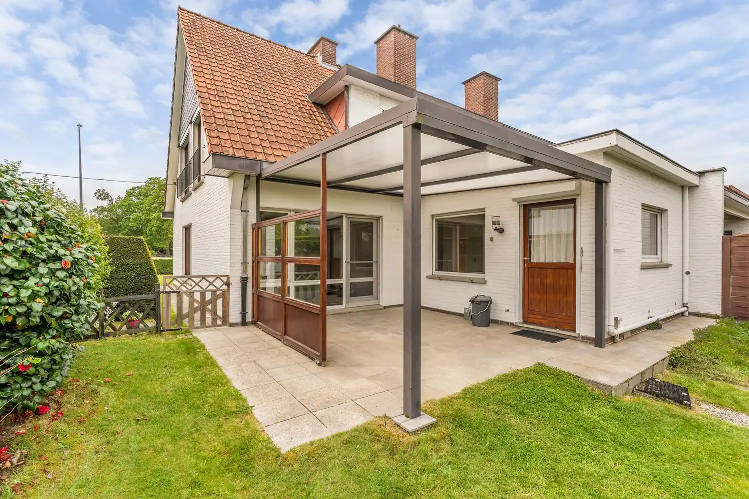 Goed gelegen woning met 4 slaapkamers, een garage en een diepe tuin in een verkeersluwe straat te Kessel-Lo! foto 9