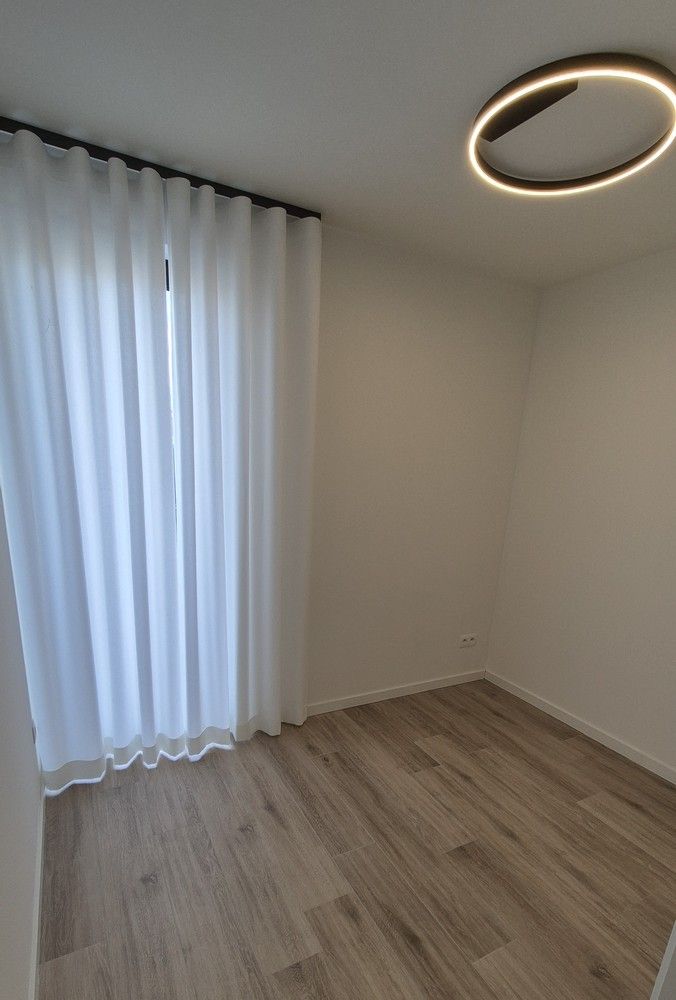 Stijlvol gelijkvloers nieuwbouwappartement met 2 autostaanplaatsen en kelder foto 9
