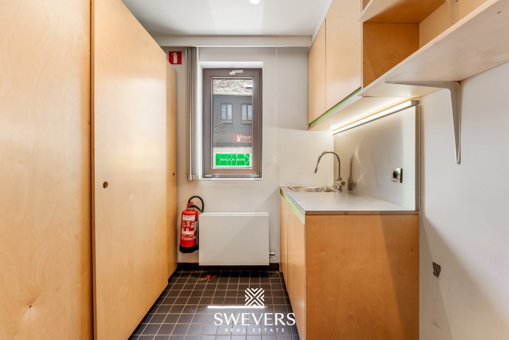 Veelzijdig handelspand op toplocatie in het centrum van Beringen foto 16