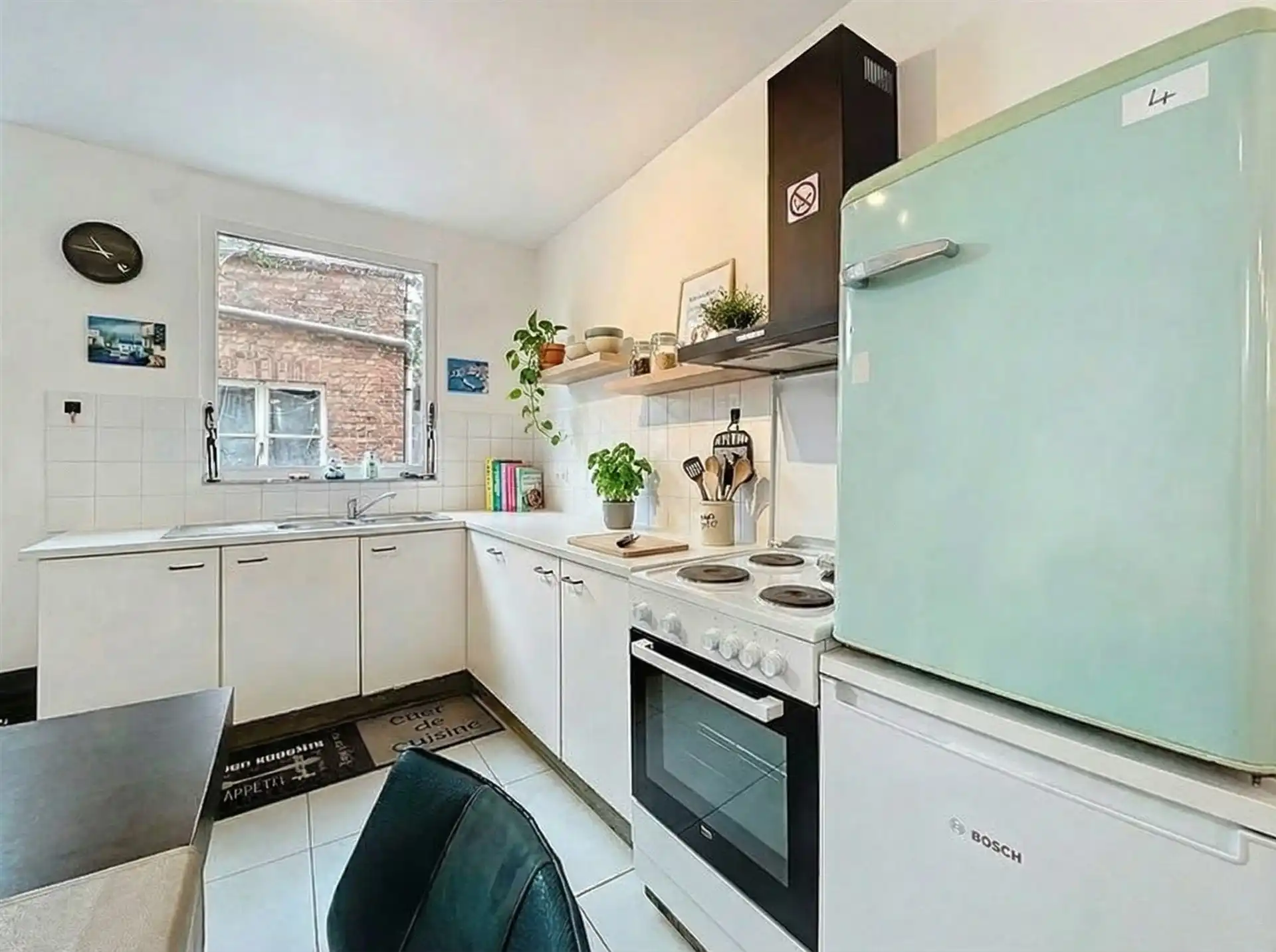 Gezeligge woning met 2 slaapkamers, volledig vernieuwd! foto 6