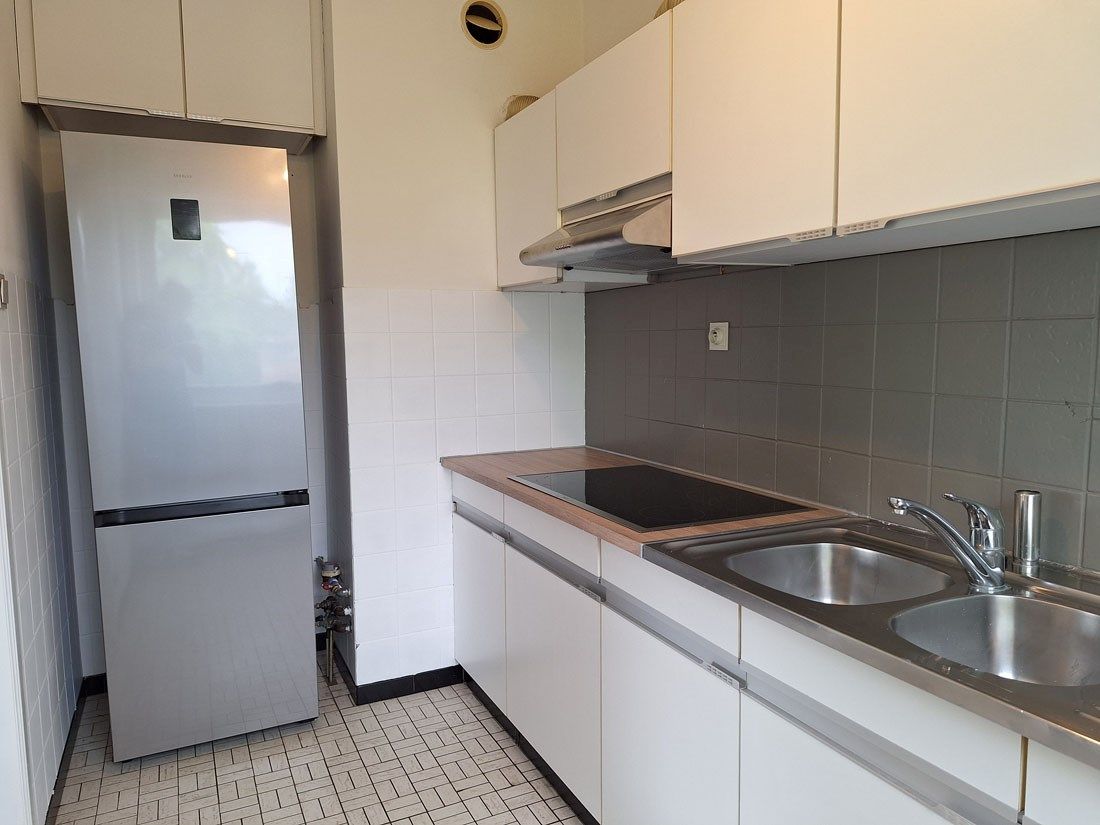 Instapklaar appartement te Lummen centrum met één slaapkamer foto 7