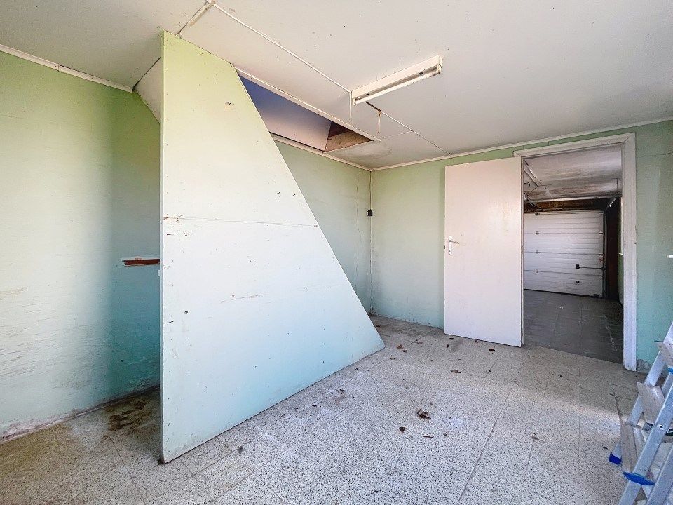 Karaktervolle alleenstaande woning met garage én tuin  foto 12