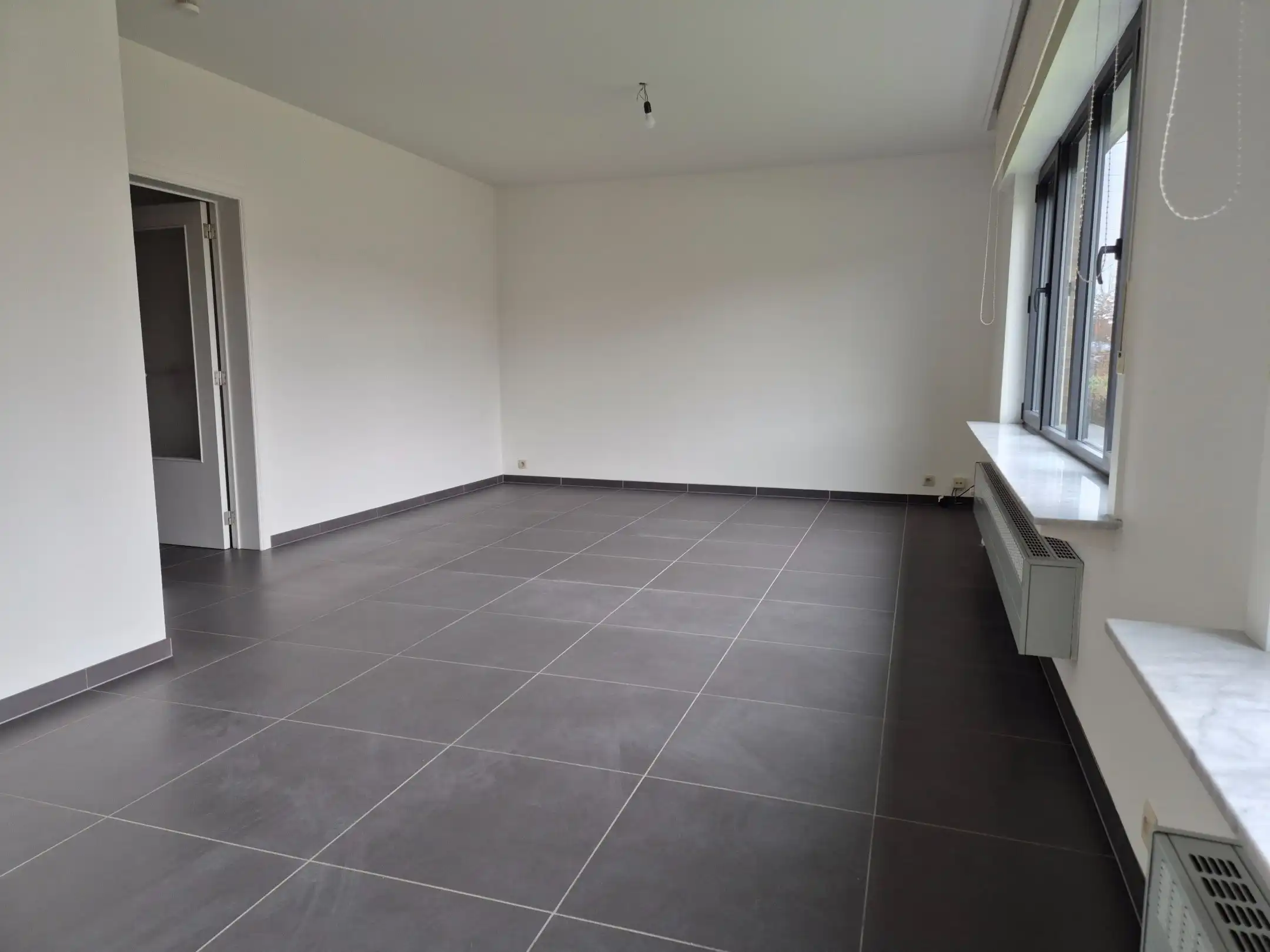 Gelijkvloers appartement met groot terras, tuin en garage. foto 7