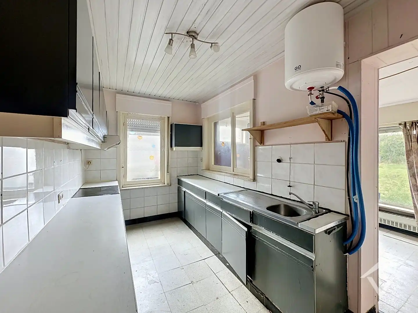 Ruime gezinswoning op perceel van 1126 m²  - tal van mogelijkheden! foto 11