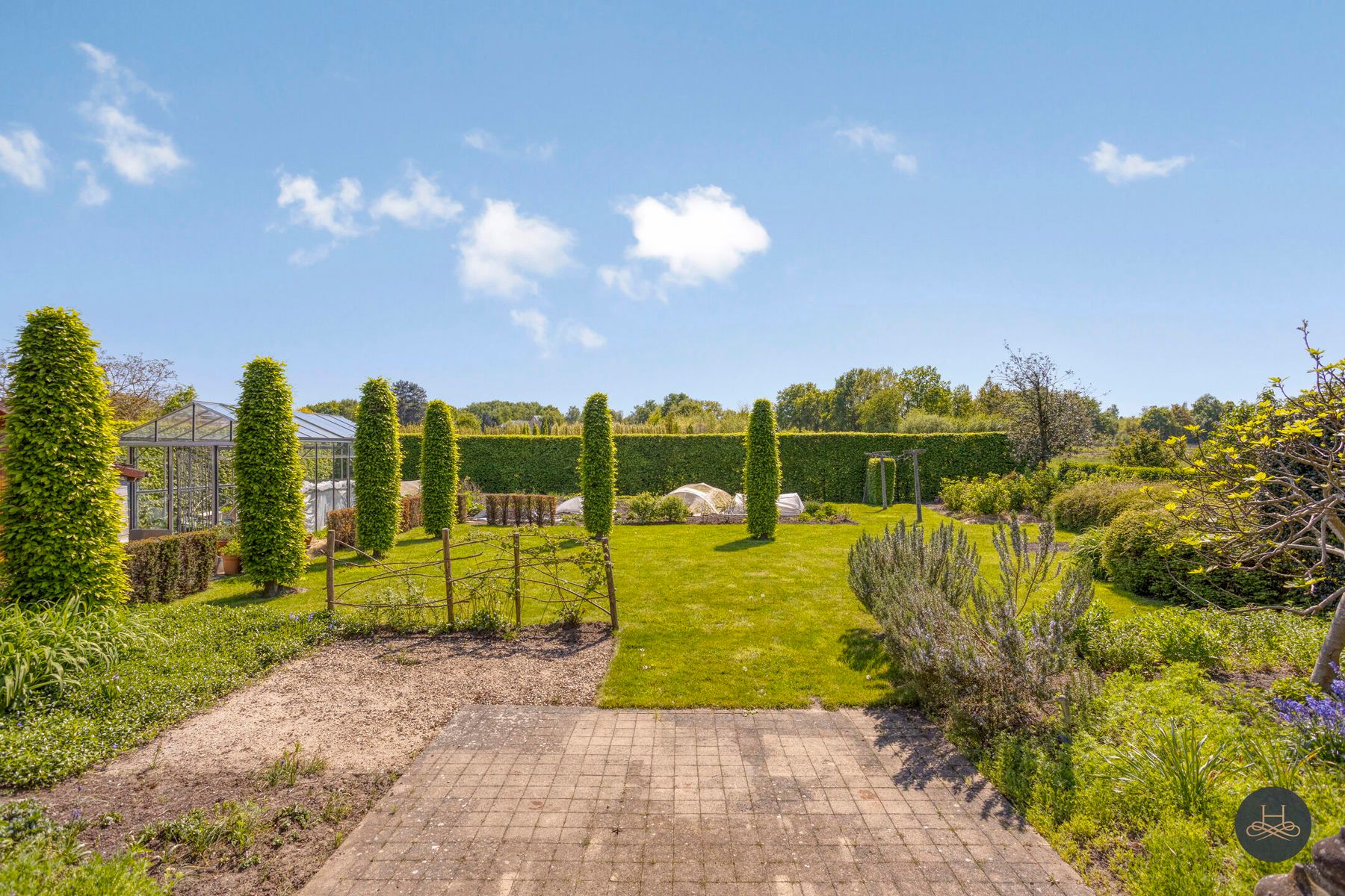 Vrijstaande woning met prachtig aangelegde zuidgerichte tuin foto 26