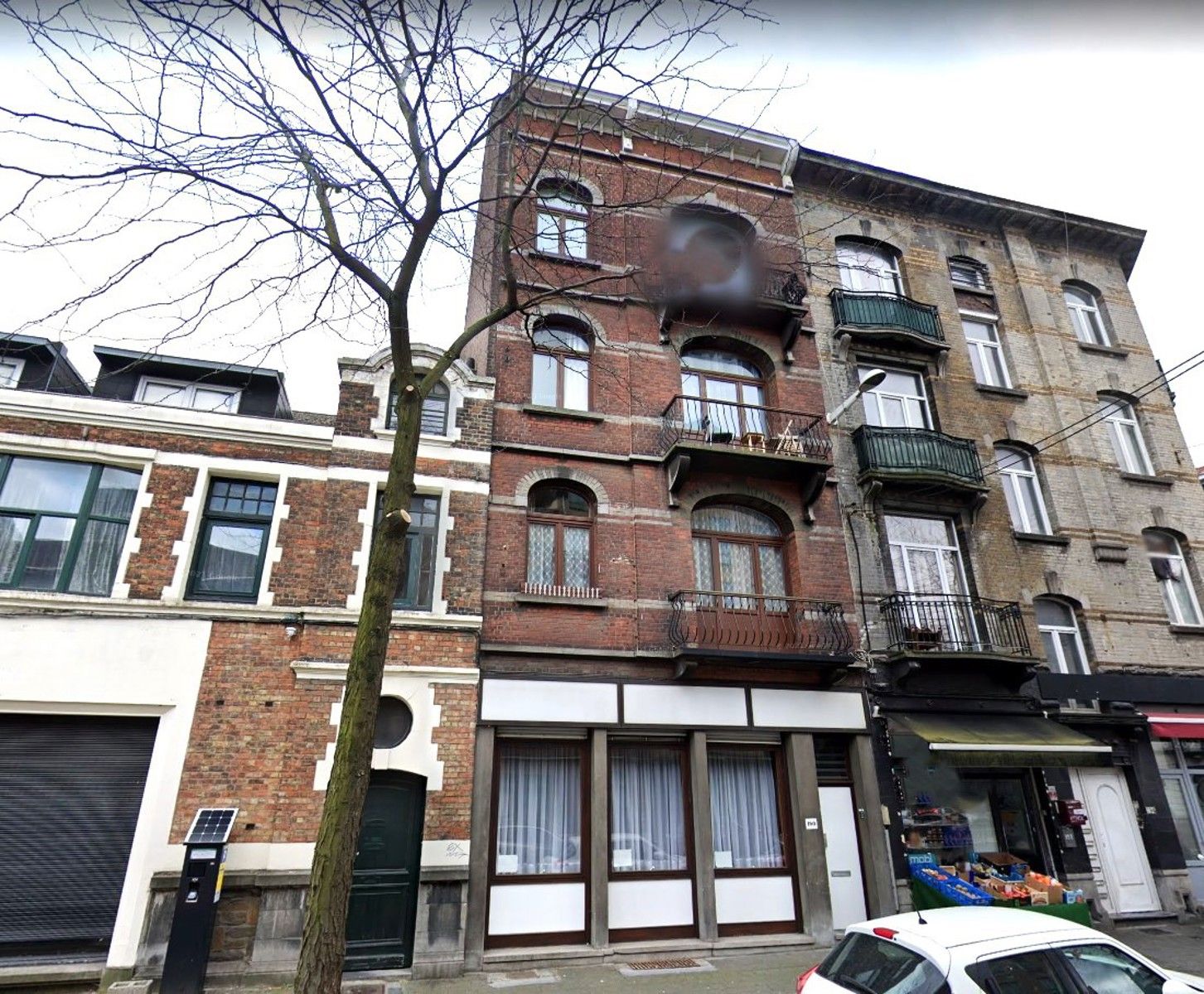 Opbrengsteigendom met 4 eenheden (winkel + 3 appartementen) foto 1