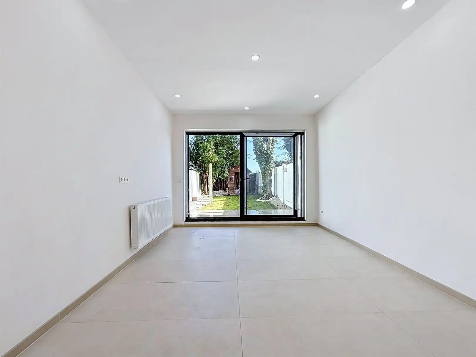 Gerenoveerde rijwoning, 4 slpks, 2 bdks, terras en tuin foto 15