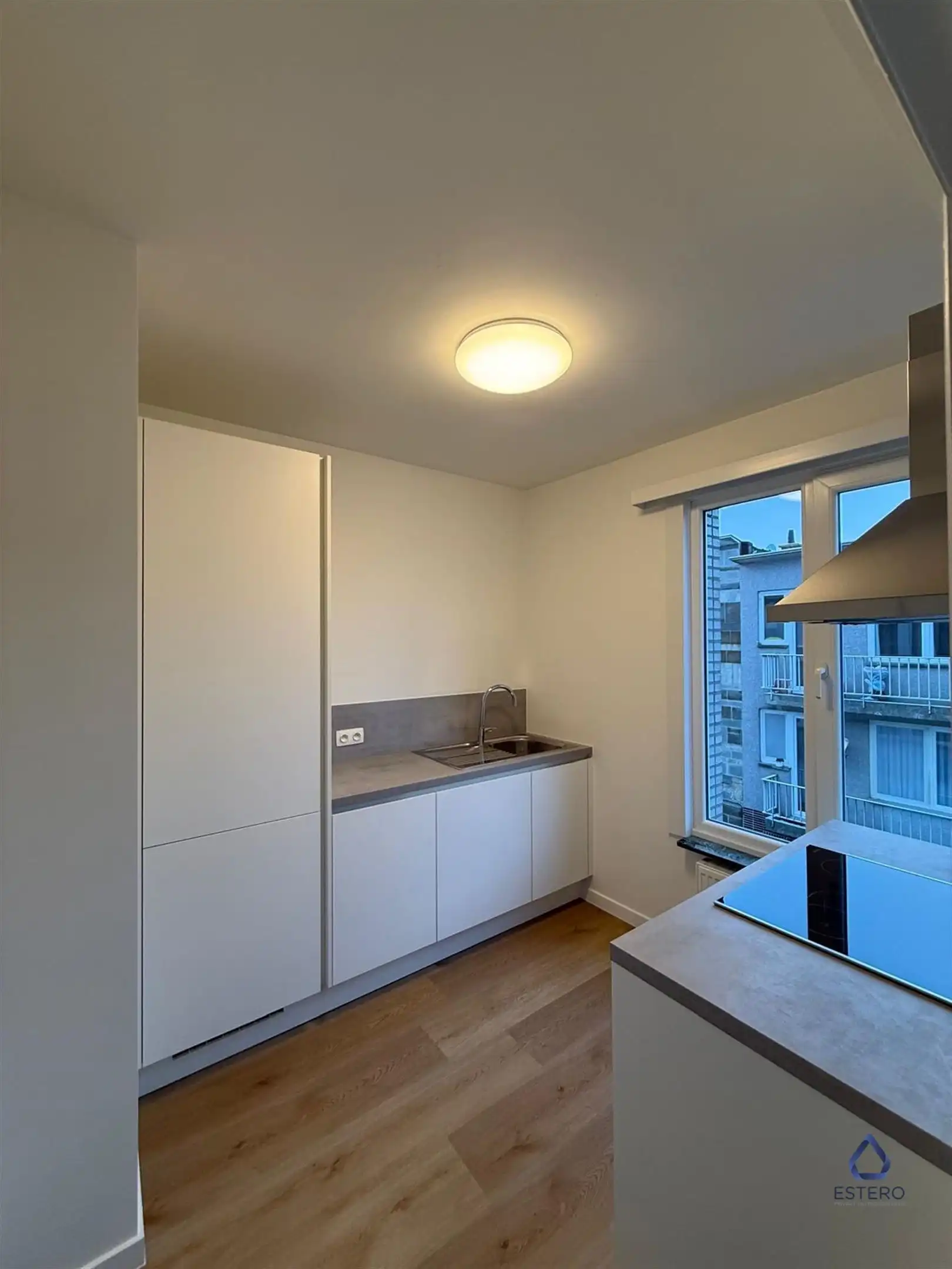 Gerenoveerd 2 slaapkamer appartement in Zellik foto 4