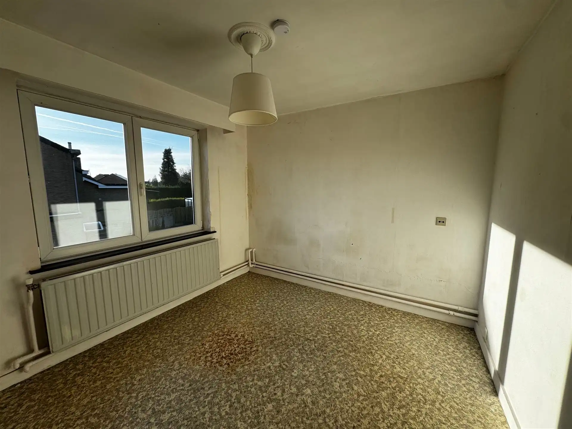 Charmante halfopen woning met uitzonderlijk ruime tuin in Maasmechelen (Boorsem) foto 11