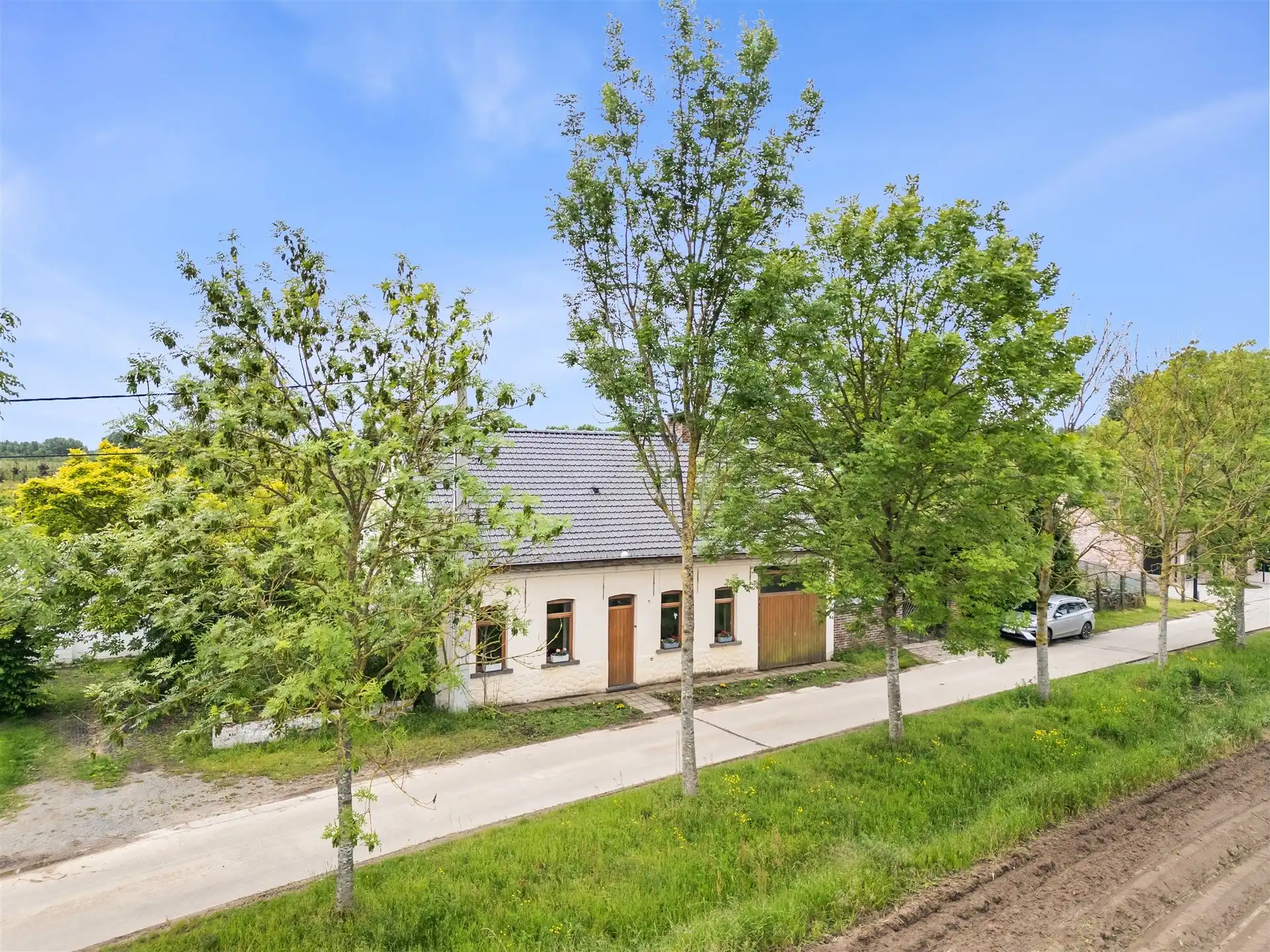 Charmante L-woning in het groene Oosterzele foto 3