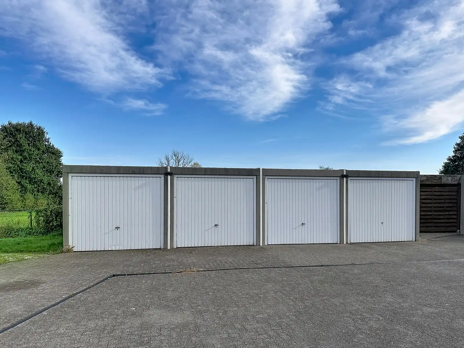 Duplex met gemeenschappelijke tuin en garagebox foto 32