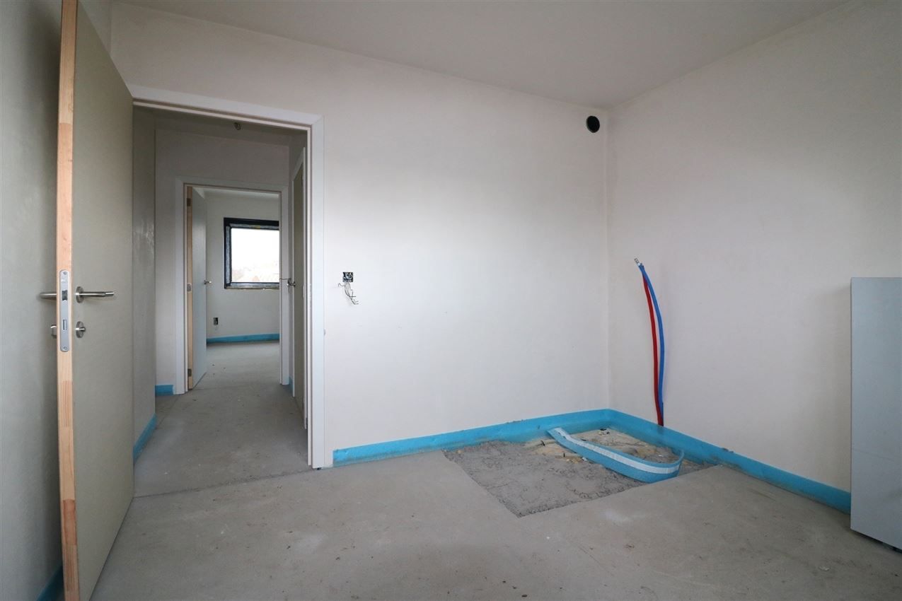 afgewerkte nieuwbouw gezinswoning 148m² bewoonbare opp (3 slpk) foto 22