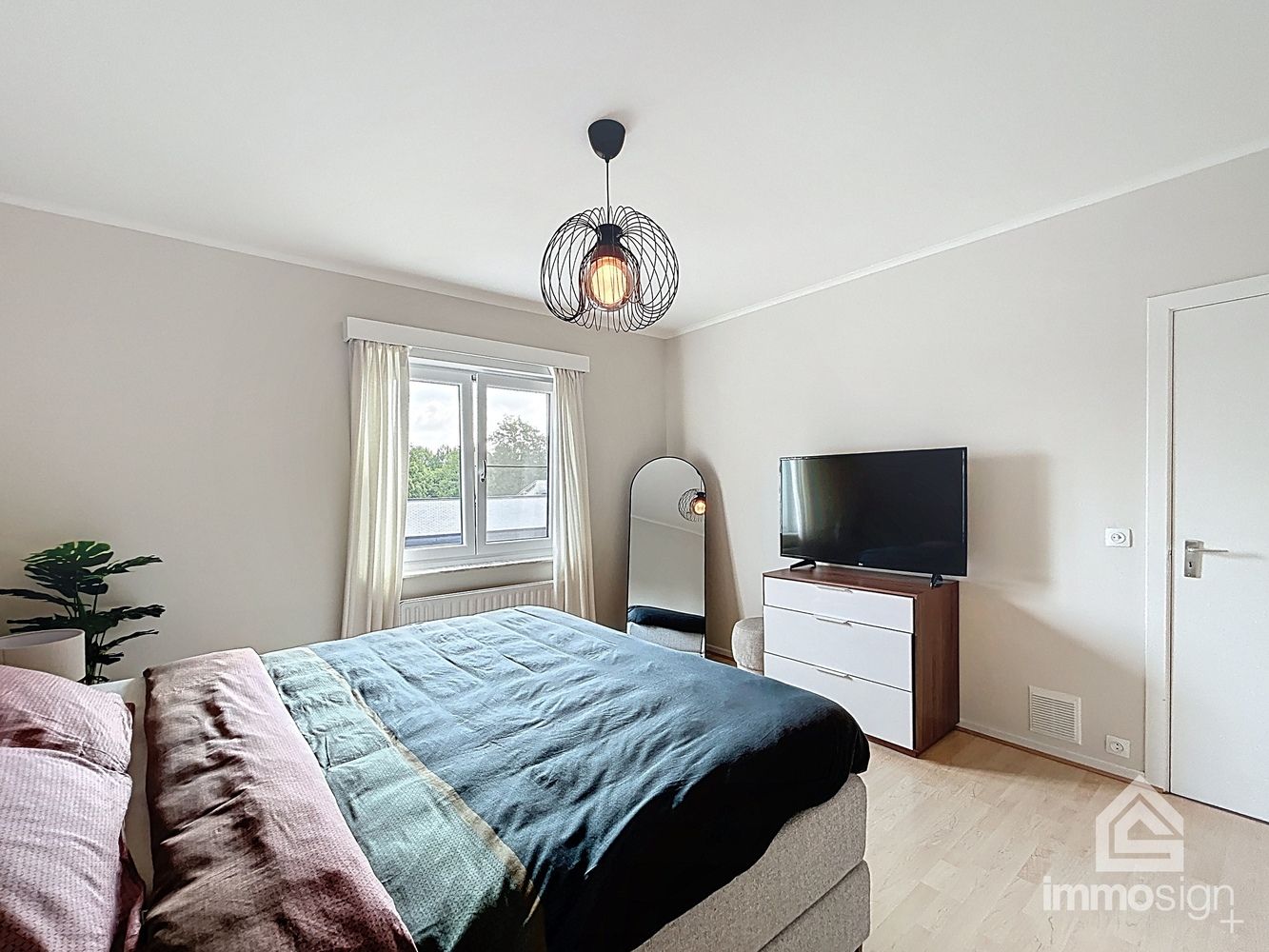 Instapklaar appartement met vernieuwd interieur, 3 slaapkamers en garage in hartje Hamont foto 15