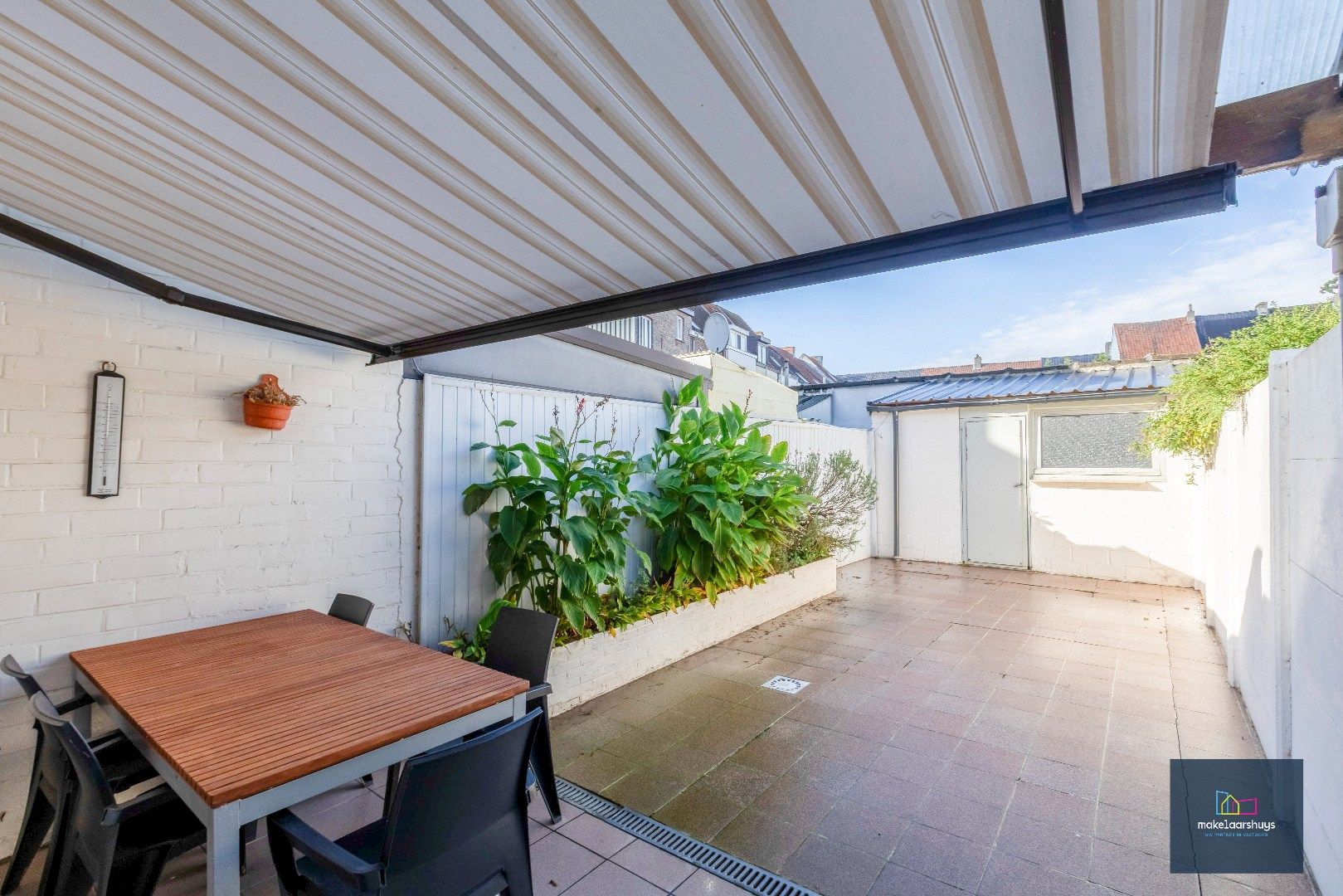 Charmante op te frissen rijwoning met ruime stadstuin  foto 17