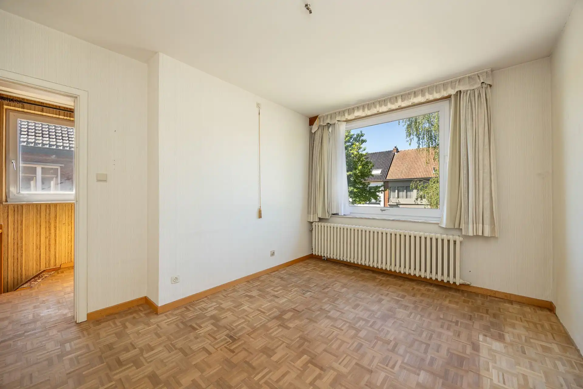 Ruime halfopen bebouwing met garage en zonnige tuin foto 20