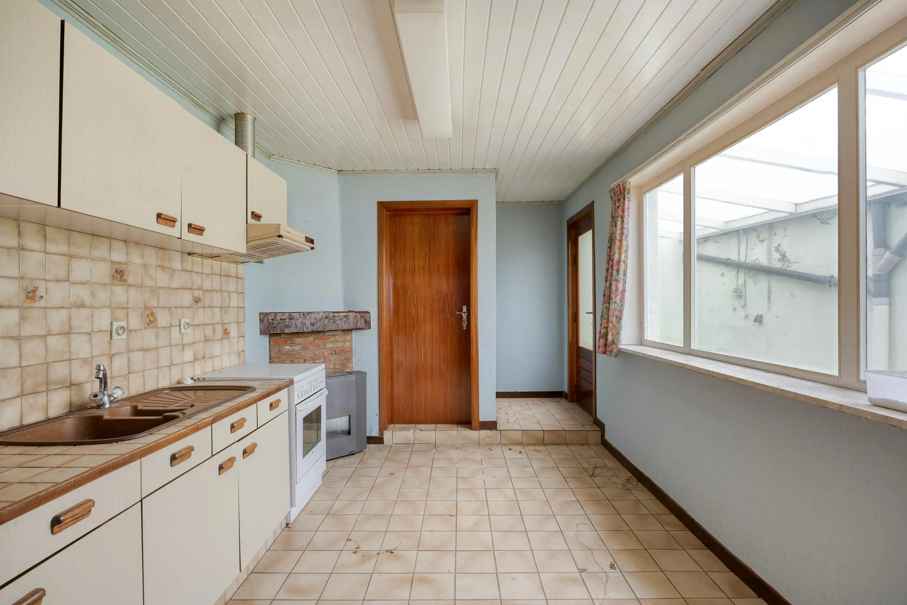 Te renoveren gezinswoning met tuin te koop in centrum Puurs foto 6