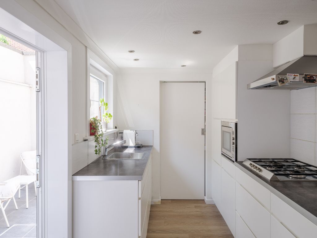 Ledeberg - Instapklare woning met 2 slaapkamers en stadskoer foto 6