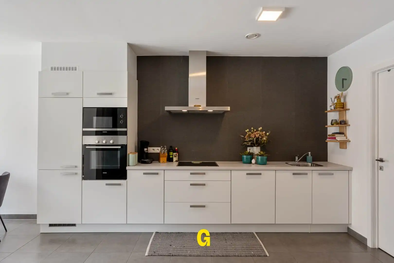 Knap ingericht gelijkvloersappartement met kelder en standplaats vlak bij het centrum foto 10