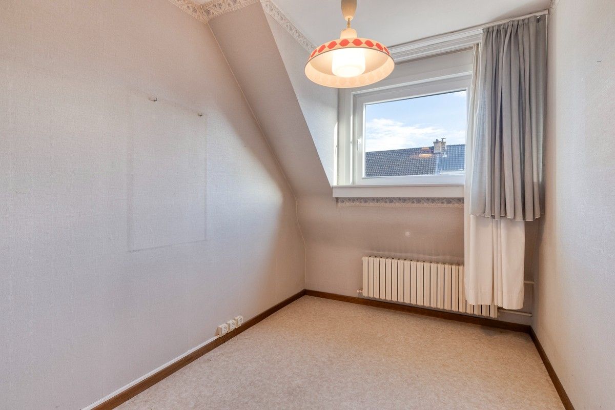 Energiezuinig bel-etage woning met zonnige tuin nabij het Sint-Pietersstation foto 14