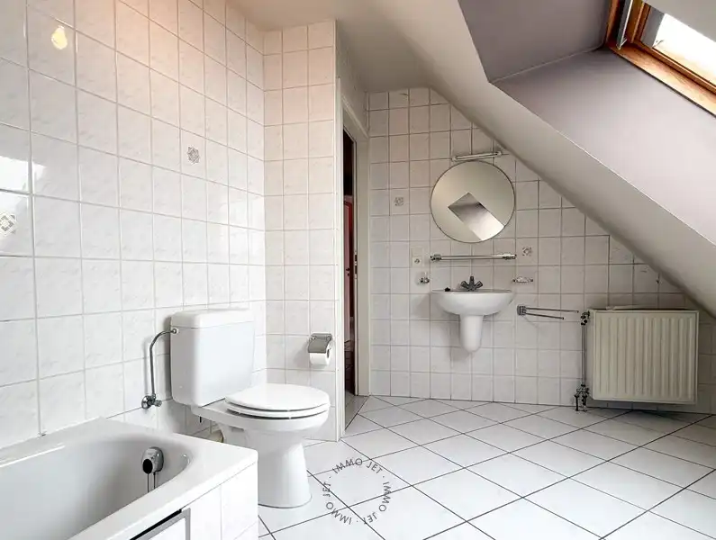 Dakappartement met 1 slaapkamer en garage in hartje Beveren foto 12