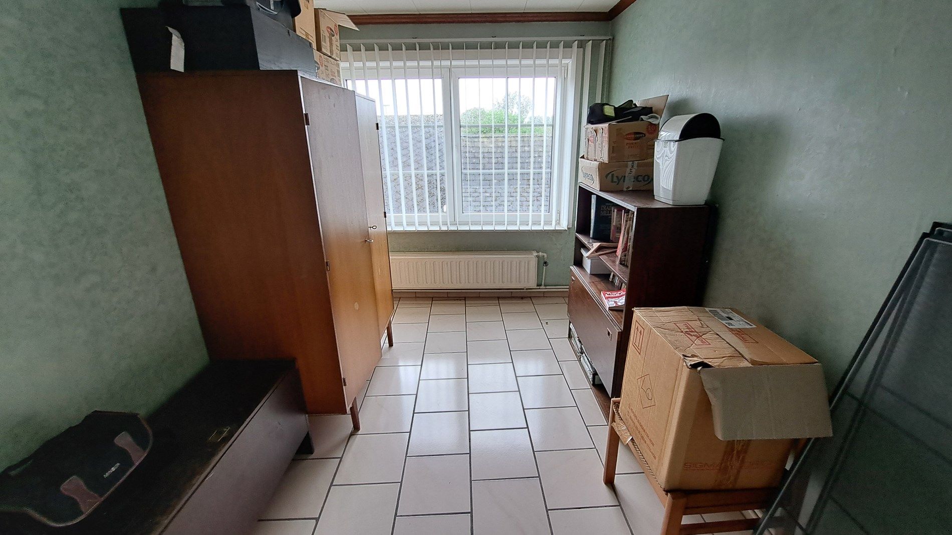 Bel-étage met grote garage, werkplaats en 3 slaapkamers foto 20