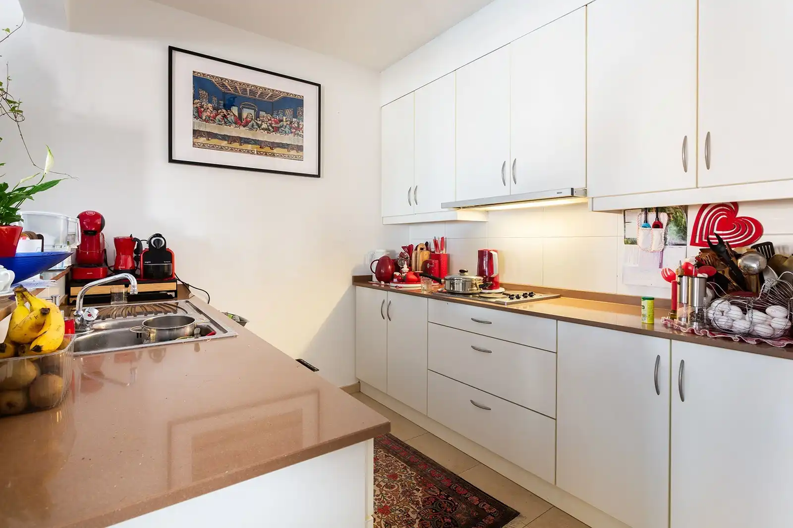 Opbrengsteigendom met 6 appartementen en 9 garageboxen foto 20