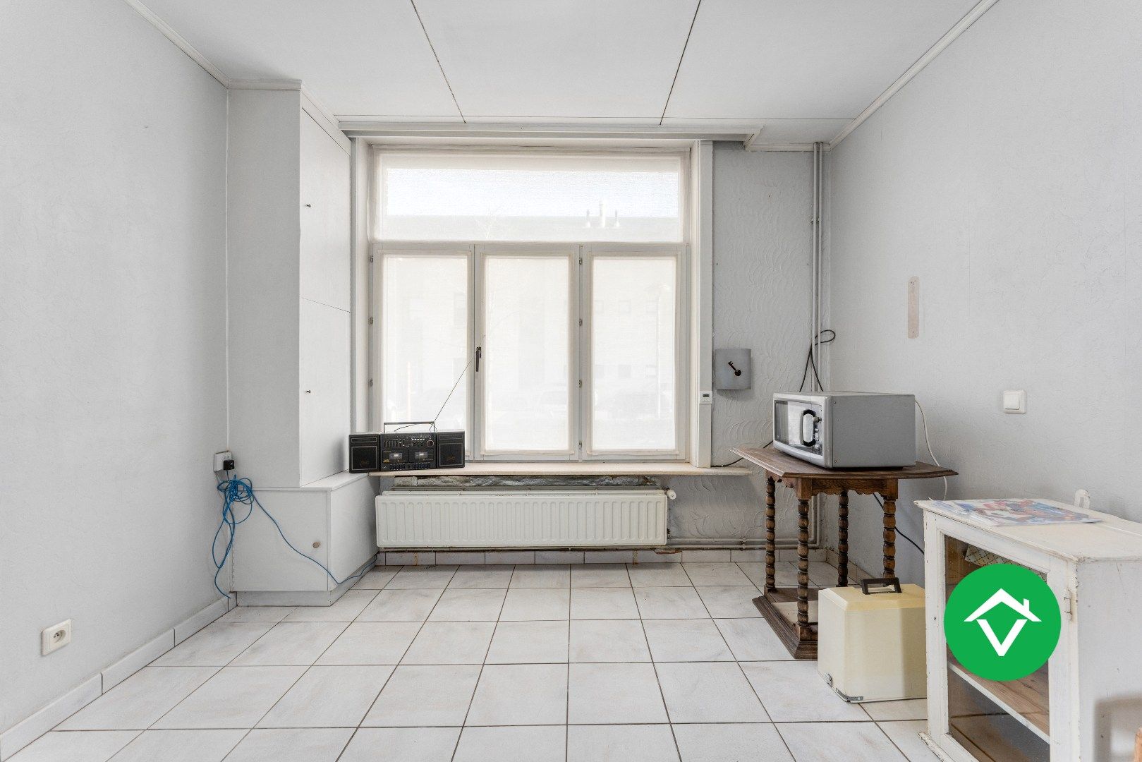 Ruim herenhuis met 4 slaapkamers en aparte garagebox in centrum Gistel foto 7