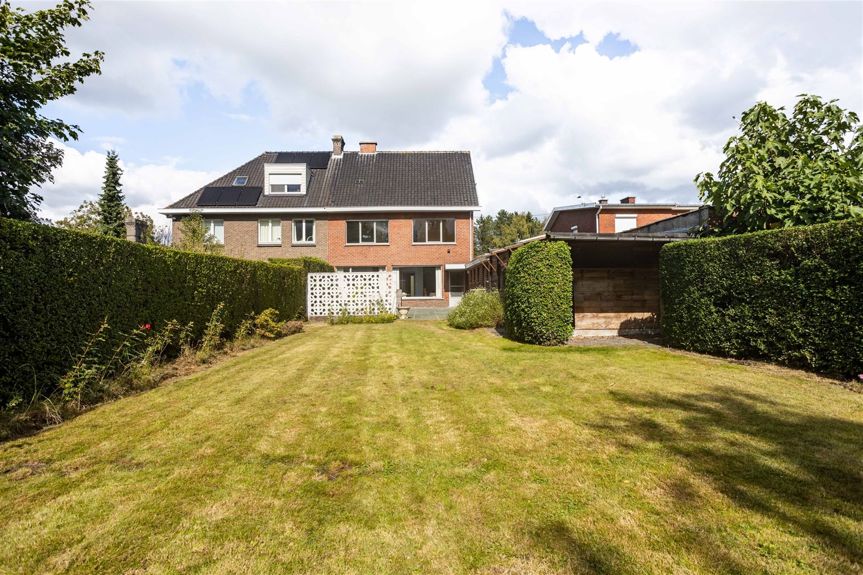 Ruime halfopen bebouwing met zuidgerichte tuin te Destelbergen. foto 16