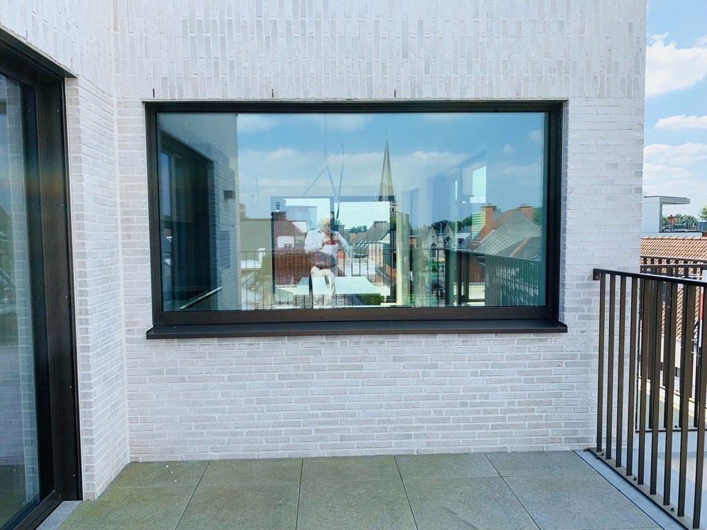 EXCLUSIEF EN LUXUEUS WONEN OP EEN BOOGSCHEUT VAN DE MARKT IN WAREGEM foto 14