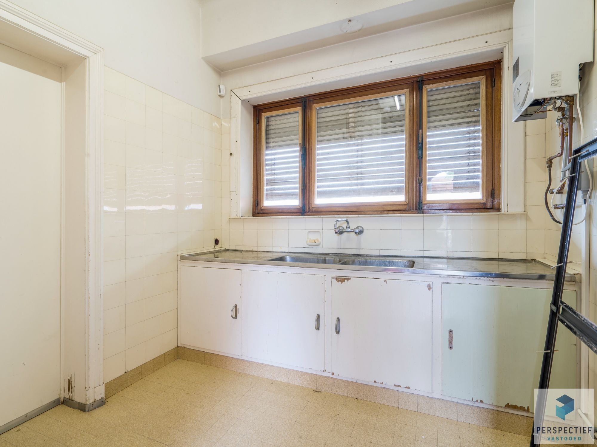 2 handelsruimtes + appartement met mogelijkheden op een strategische ligging te Roeselare foto 47