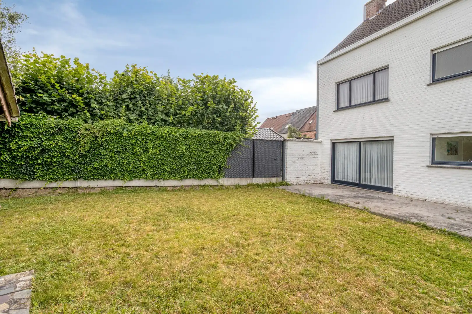Degelijke woning met 4 slaapkamers, garage en tuin! foto 17