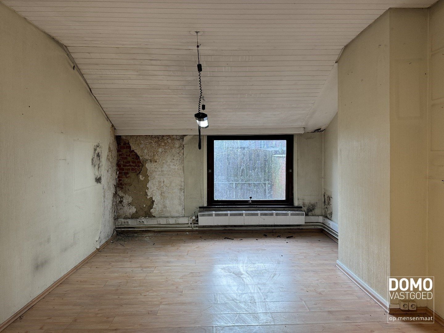 Te renoveren handelshuis gelegen in het centrum van Diepenbeek. foto 5