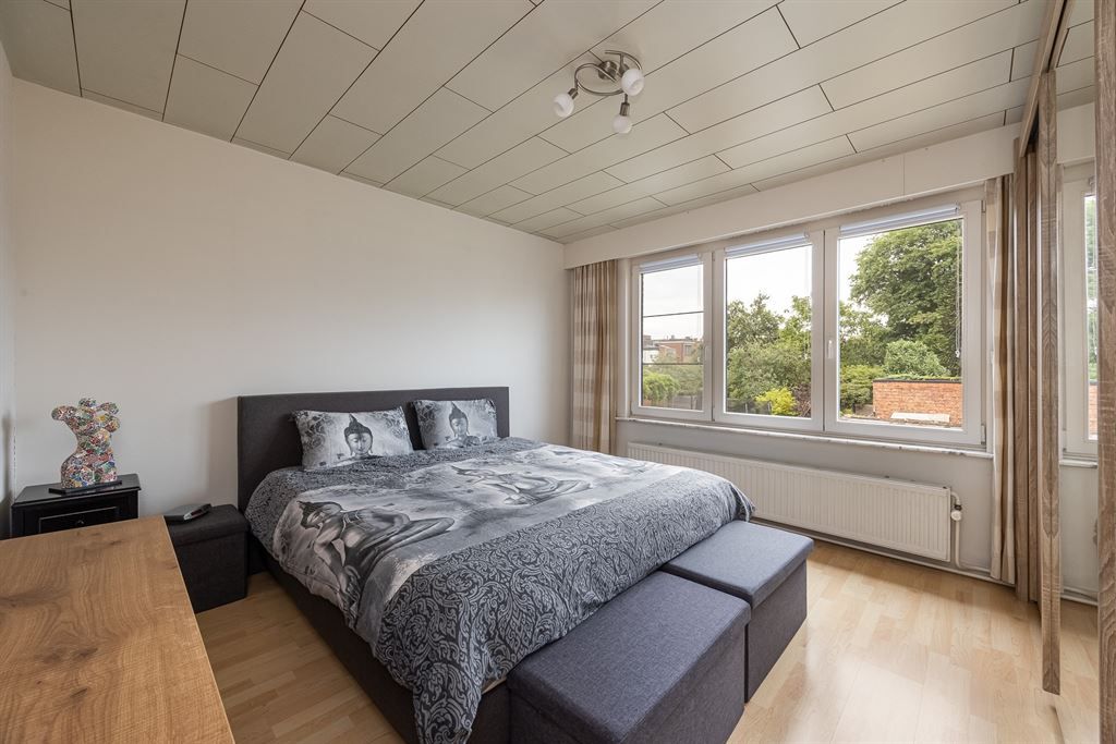 Woning vol potentieel met grote zonnige tuin foto 9
