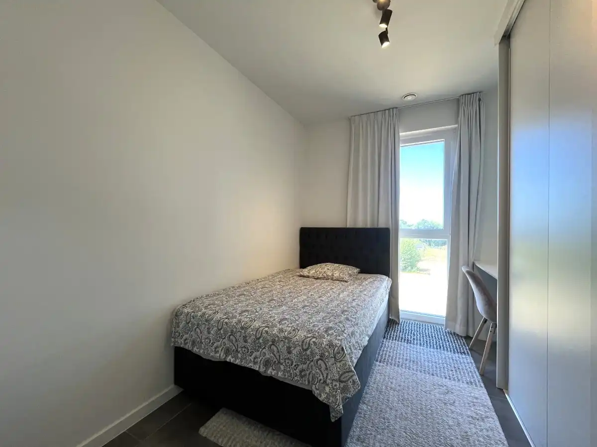 Roeselare – Modern appartement met 2 slaapkamers, zonnig terras en garage foto 9