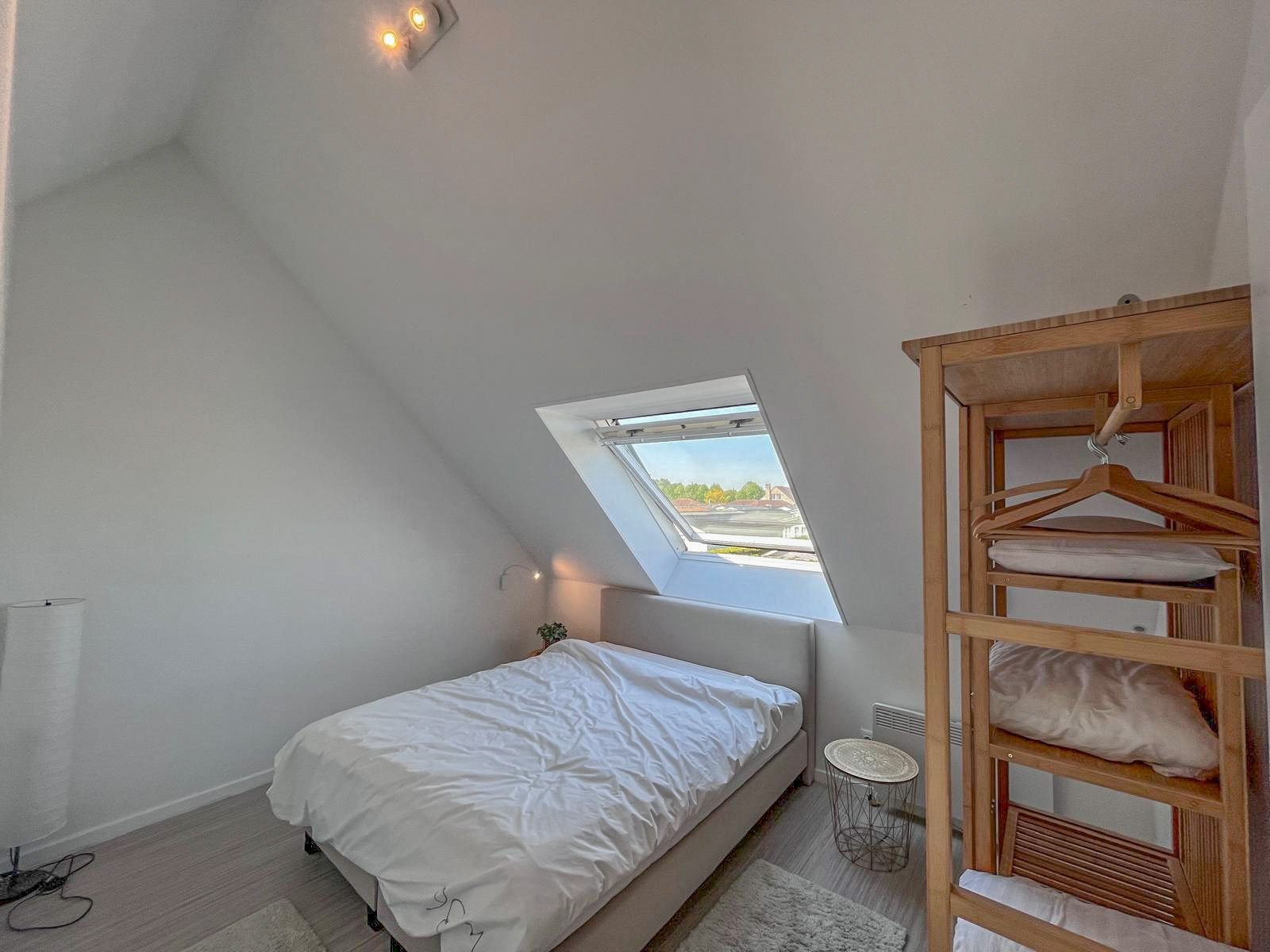 Vakantiewoning met zuid gerichte tuin op wandelafstand van de beschermde duinen  foto 13