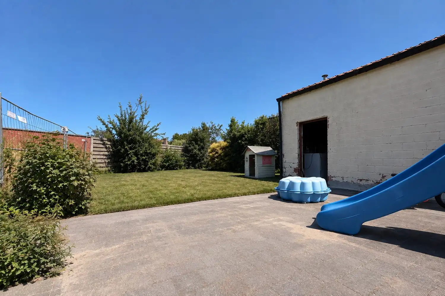 Instapklare woning met 3 slpks. + garage én zonnige tuin foto 9