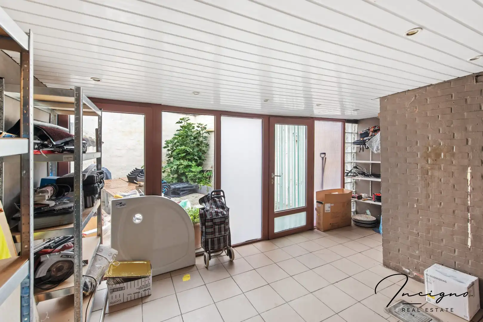 Op te frissen rijwoning met 4 slaapkamers & stadskoer foto 9