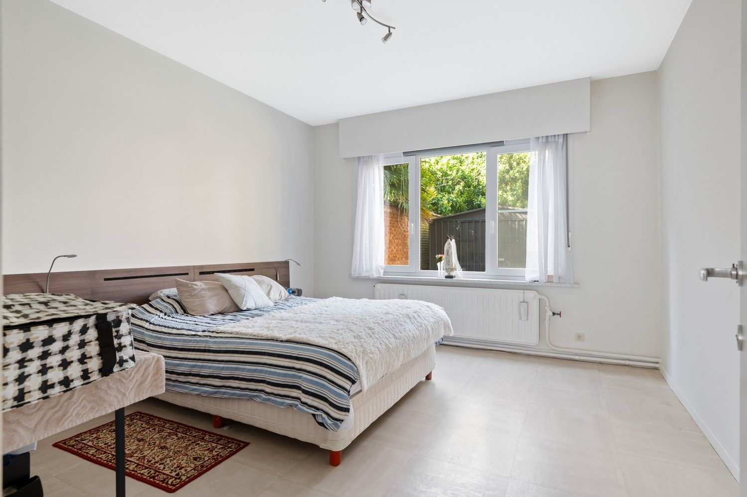 Gelijkvloers appartement met 2 ruime slaapkamers en tuin! foto 10