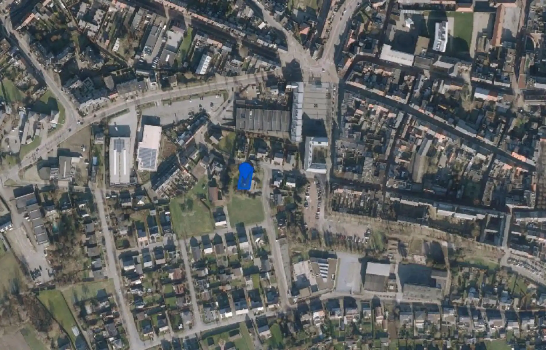 Grond voor open bebouwing van 05a09ca in centrum Maaseik.  foto {{pictureIndex}}