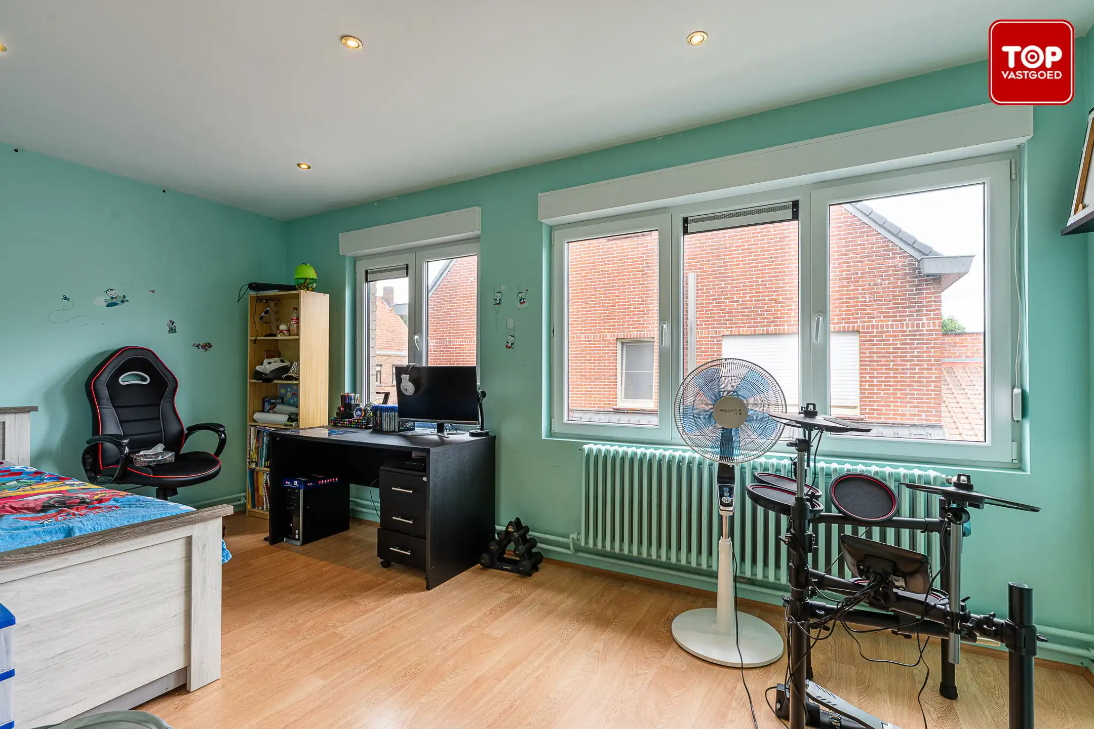 Instapklare halfopen woning in een gezinsvriendelijke buurt. foto 12