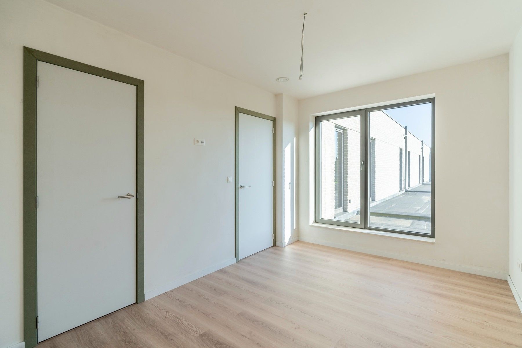 Lot 5: Halfopen bebouwing met 3 slpk., tuin en fietsberging foto 11