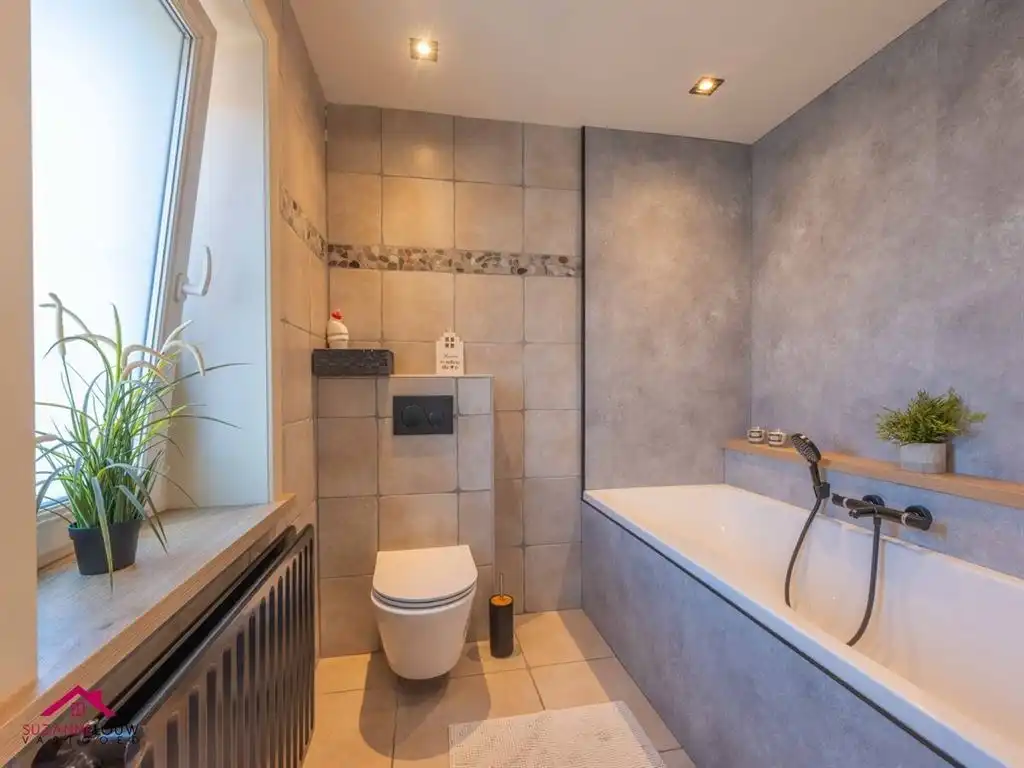 Instapklare woning met handelsruimte in gesloten bebouwing foto 34