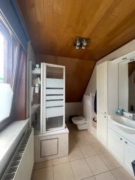 Instapklare half-open bebouwing met mooie tuin & garage foto 14