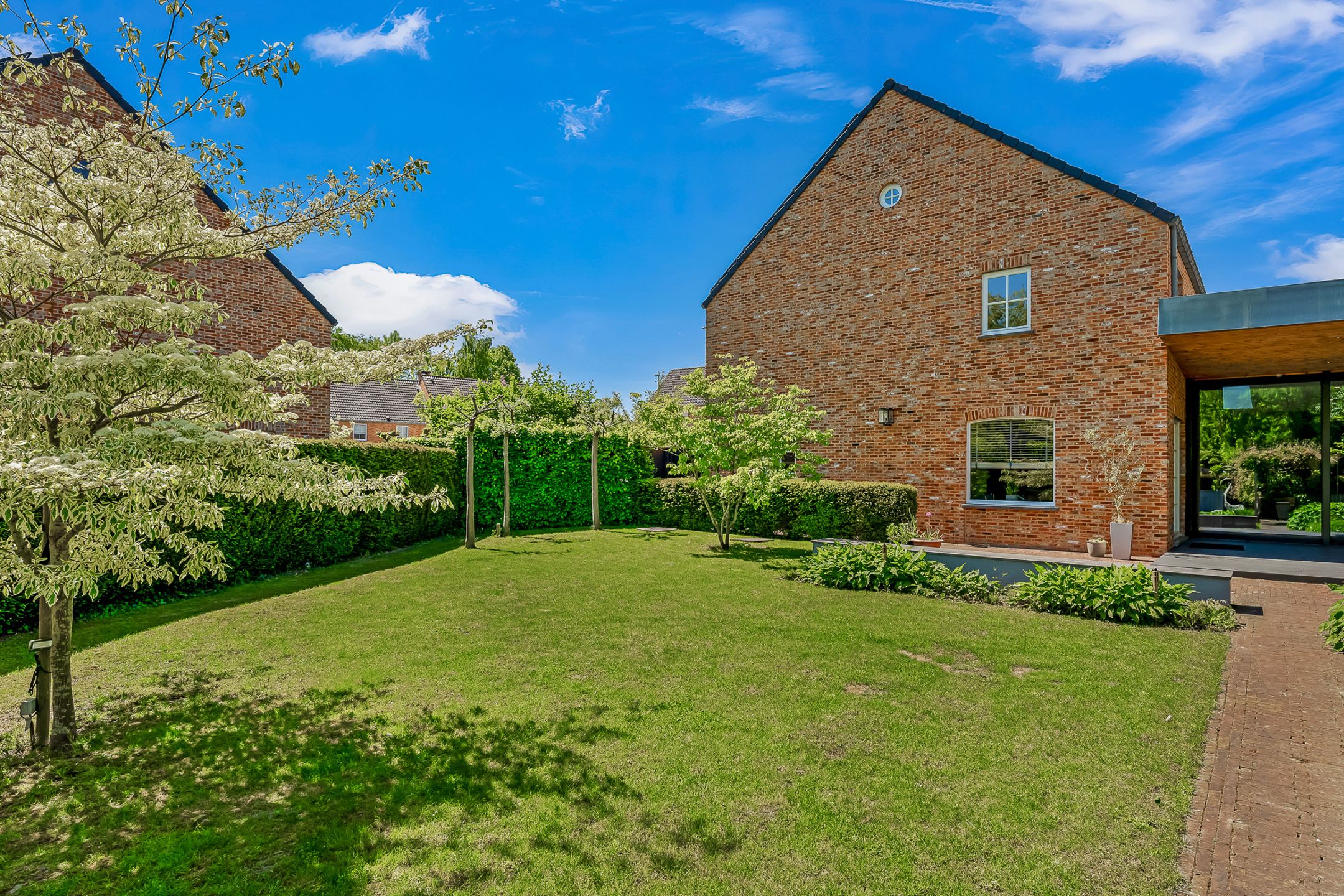 Instapklare woning met tuingerichte aanbouw foto 35